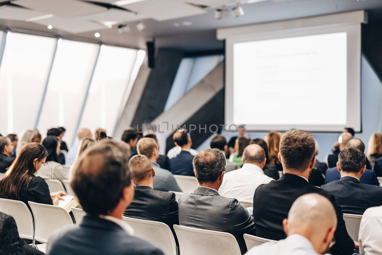 Round table discussion at business conference meeting event.. Audience at the conference hall. Business and entrepreneurship symposium. by kasto