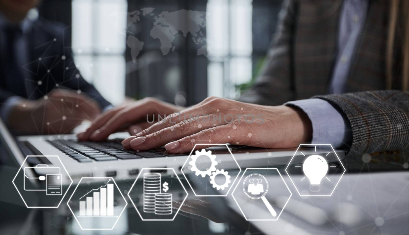 Close-up of male hands using laptop at office