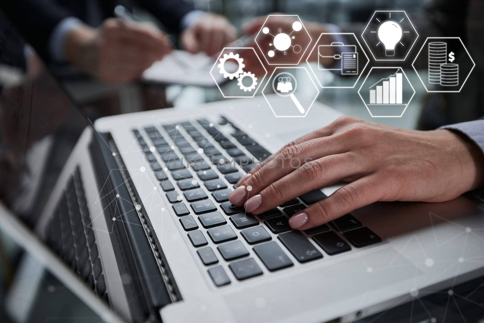 Close-up of male hands using laptop at office