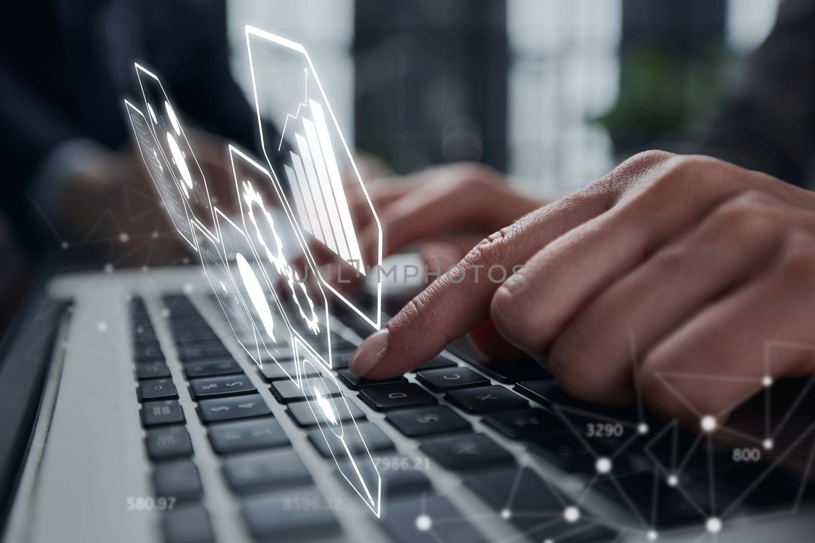 Close-up of male hands using laptop at office