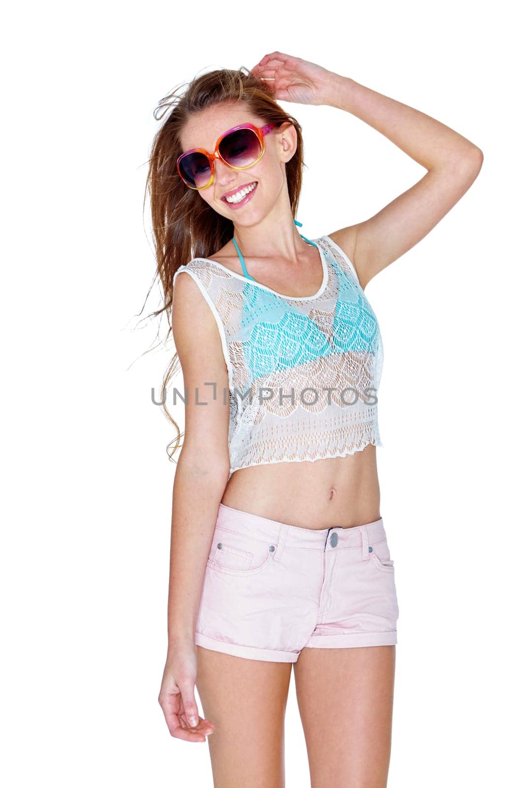 Showing off her summer style. Studio shot of a young woman dressed for summer isolated on white
