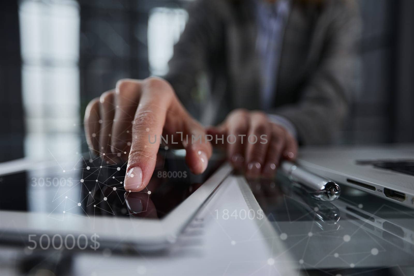 businessman pressing his finger on the screen of the digital tab