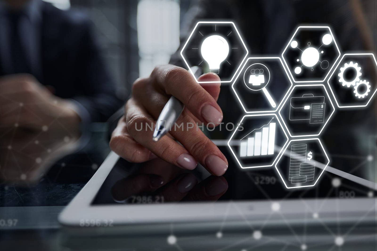 close up. businessman pressing his finger on the screen of the digital tablet