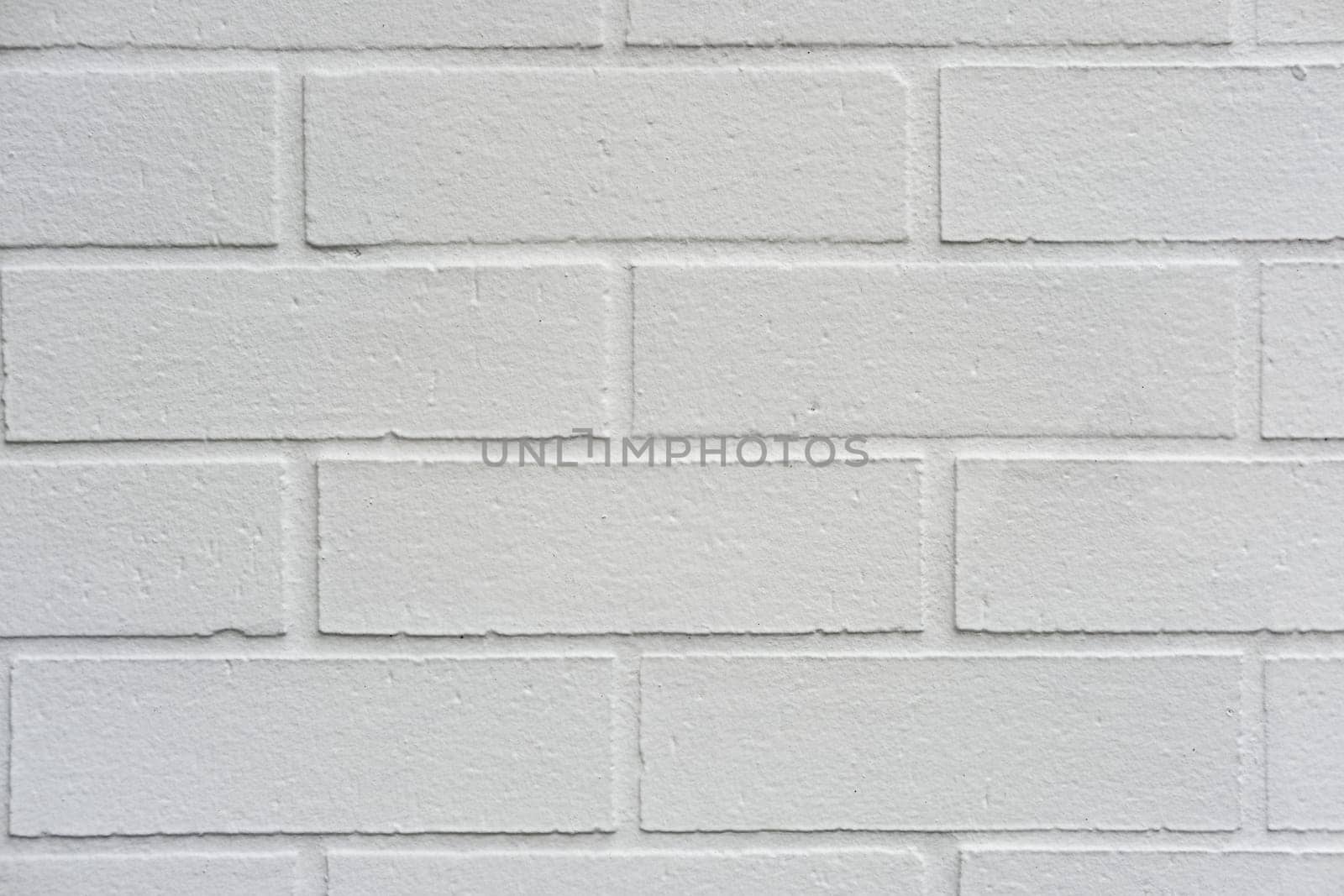 Background from a painted white stone wall