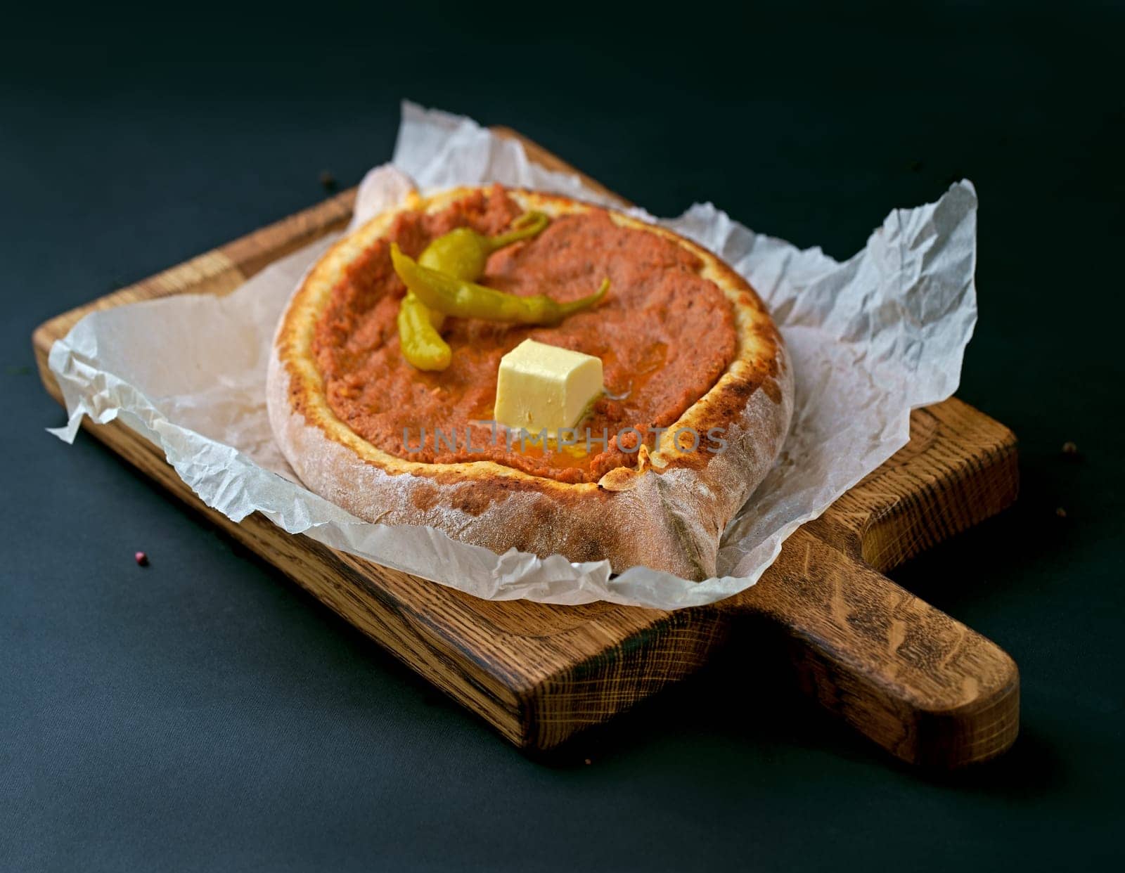 Khachapuri Georgian traditional cheese pie with feta mozzarella. Hand taking cheese pie by aprilphoto