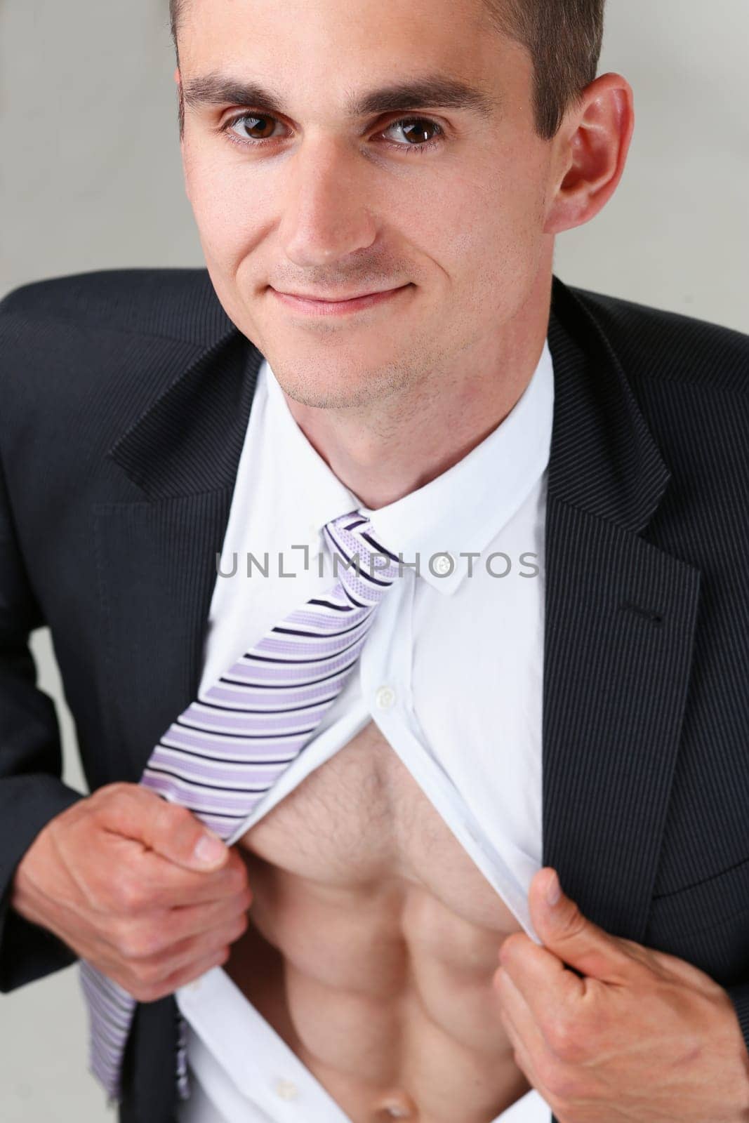 man in tie rip clothes off torso showing abs by kuprevich