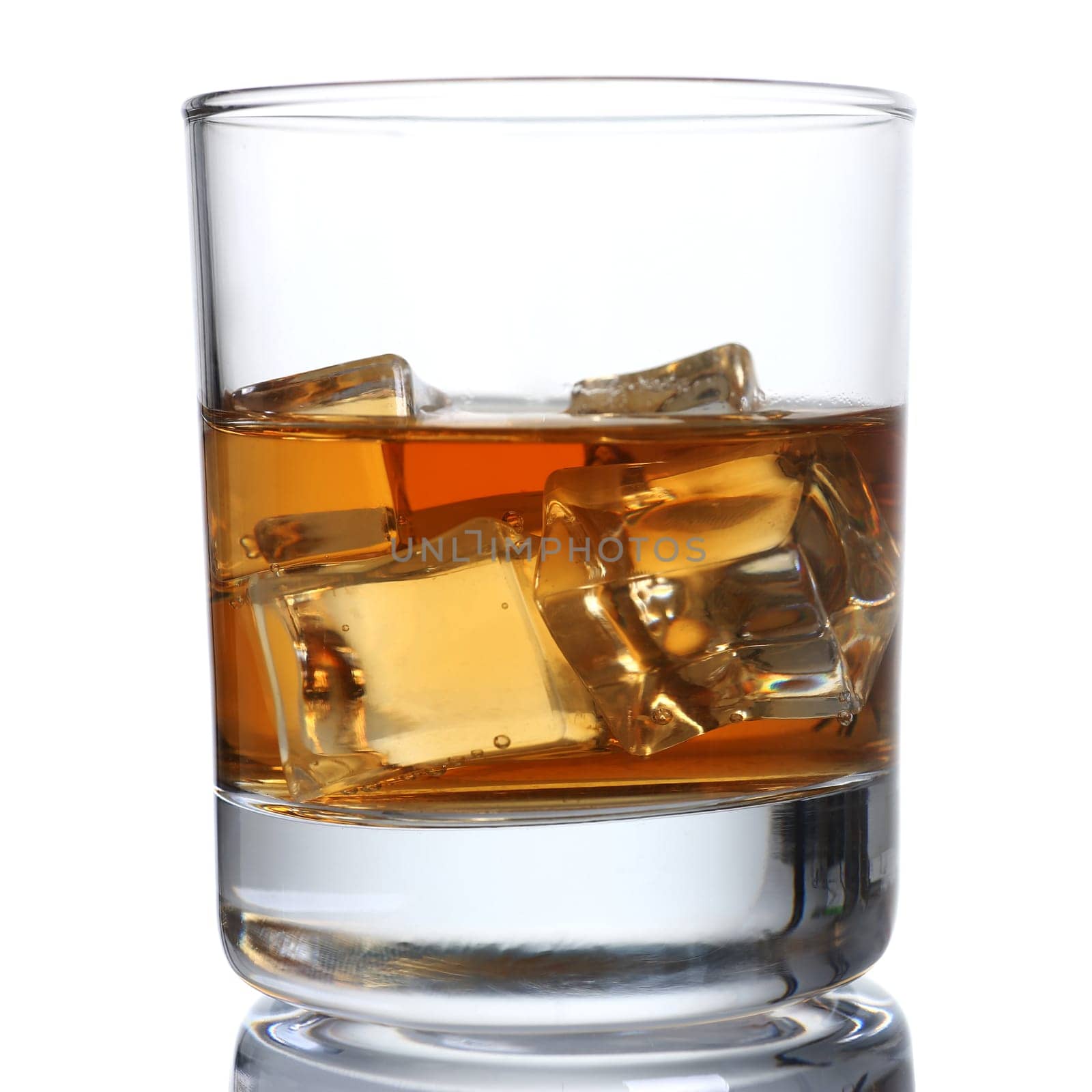 Whiskey with ice in a glass isolated by kuprevich