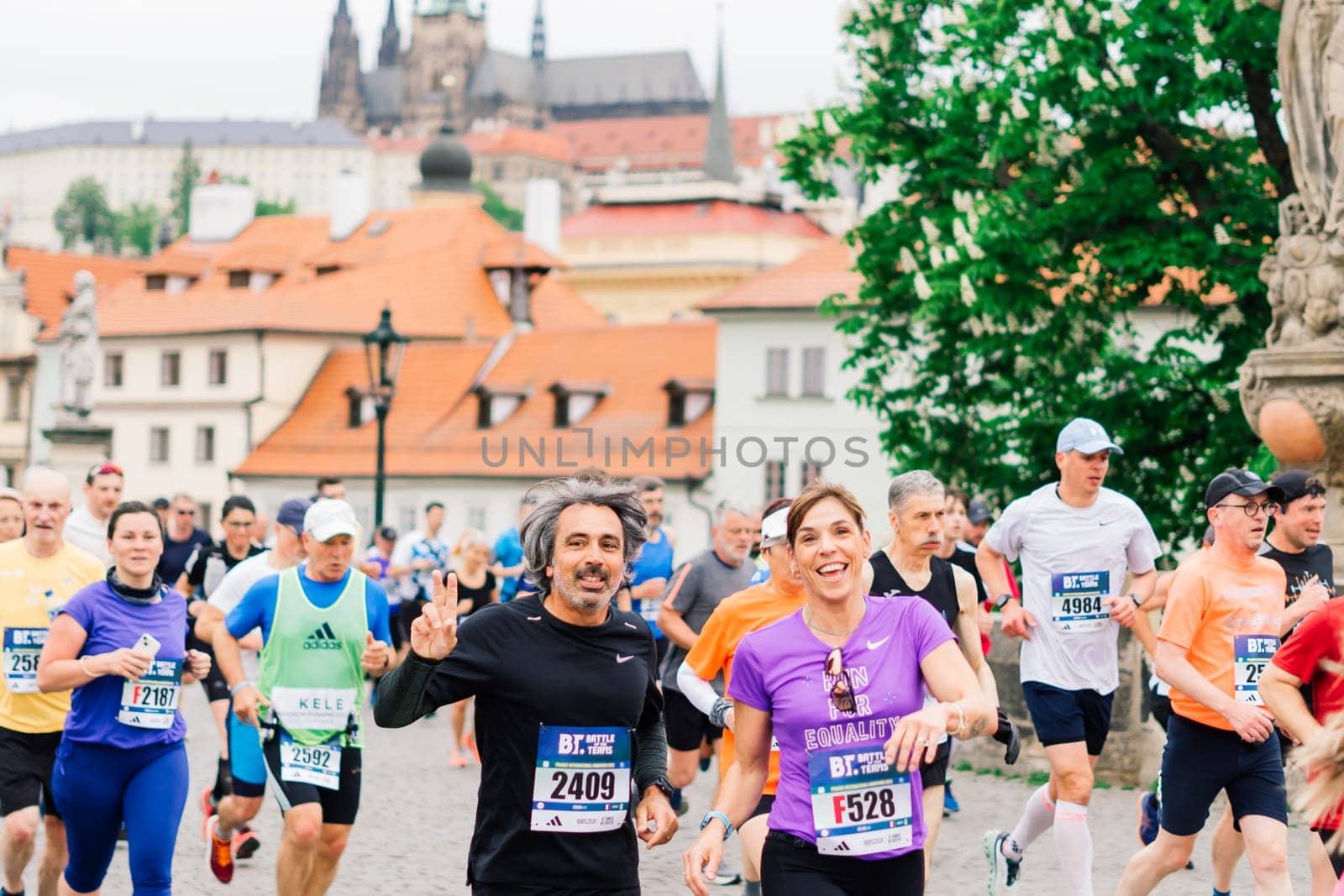 Prague, Czechia - 7th May 2023 - Runners of the Prague Half marathon in the city streets. by Zelenin