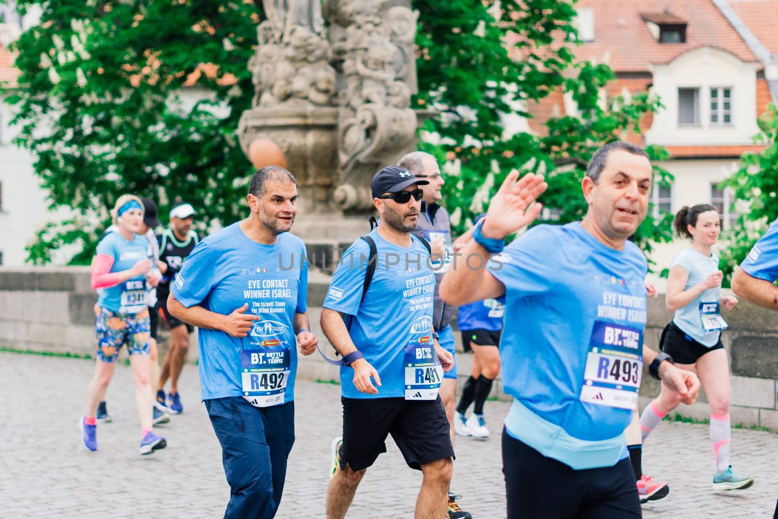 Prague, Czechia - 7th May 2023 - Runners of the Prague Half marathon in the city streets. by Zelenin