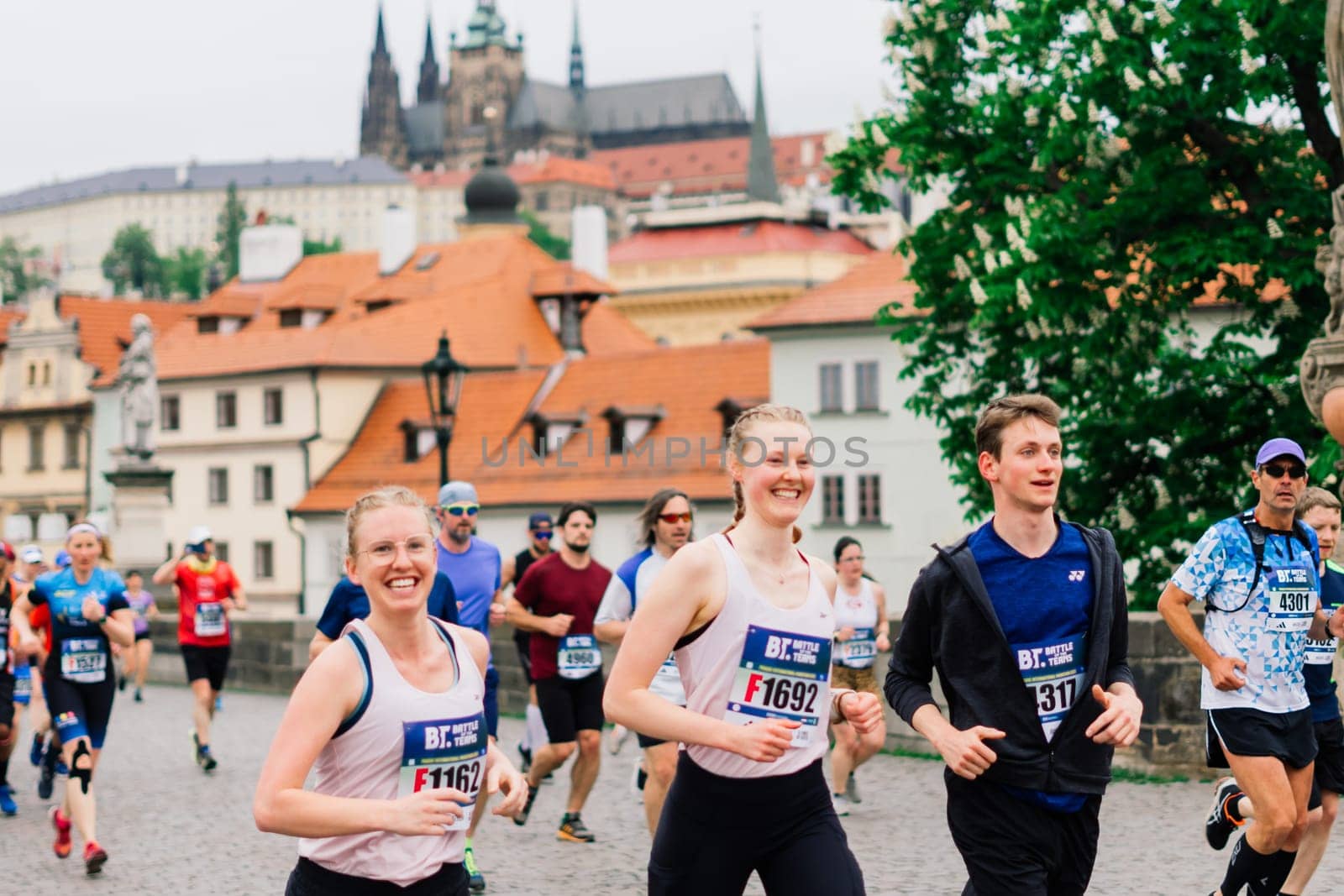 Prague, Czechia - 7th May 2023 - Runners of the Prague Half marathon in the city streets. by Zelenin