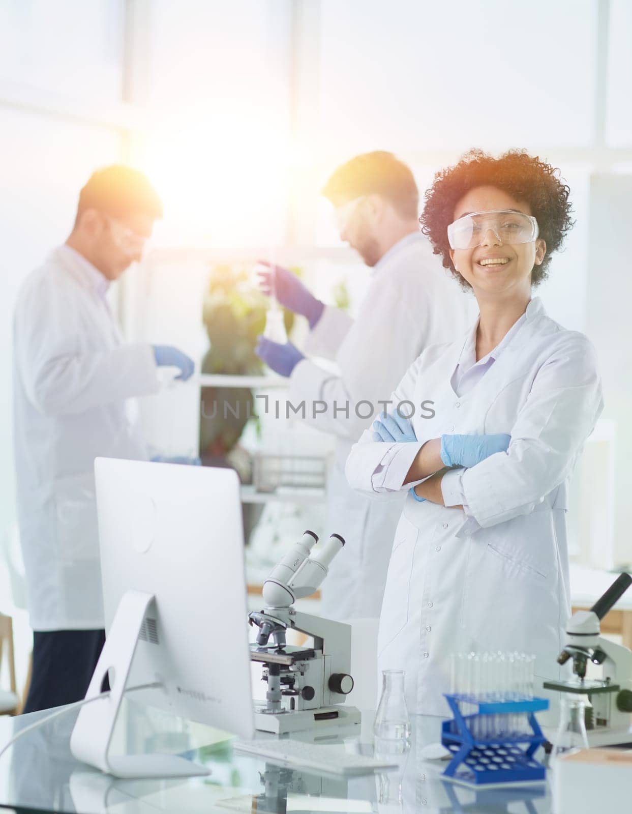 Scientists smiling together in lab