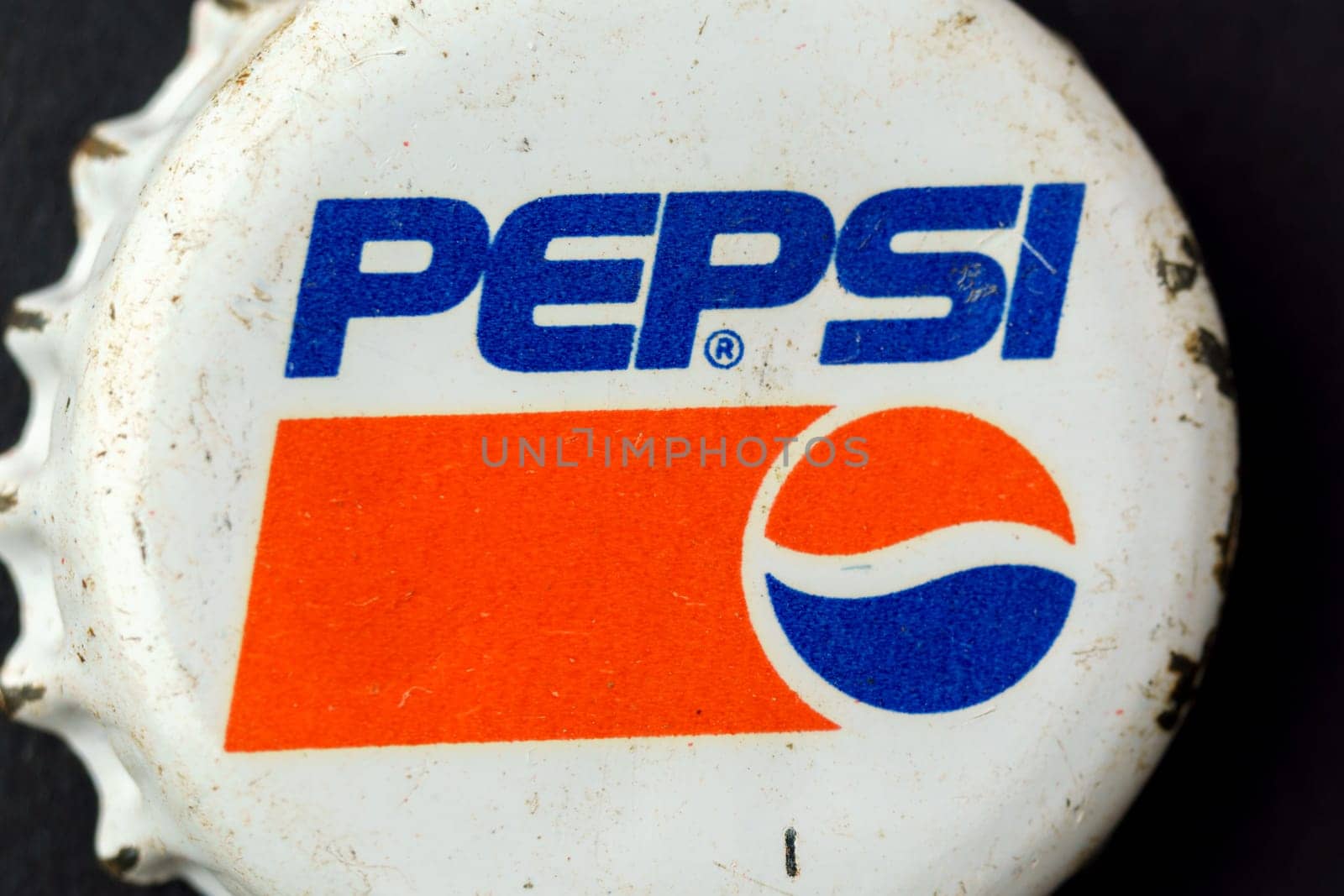 Tyumen, Russia-February 15, 2023: Vintage Pepsi Cola metal cap, close up logo. Retro style.