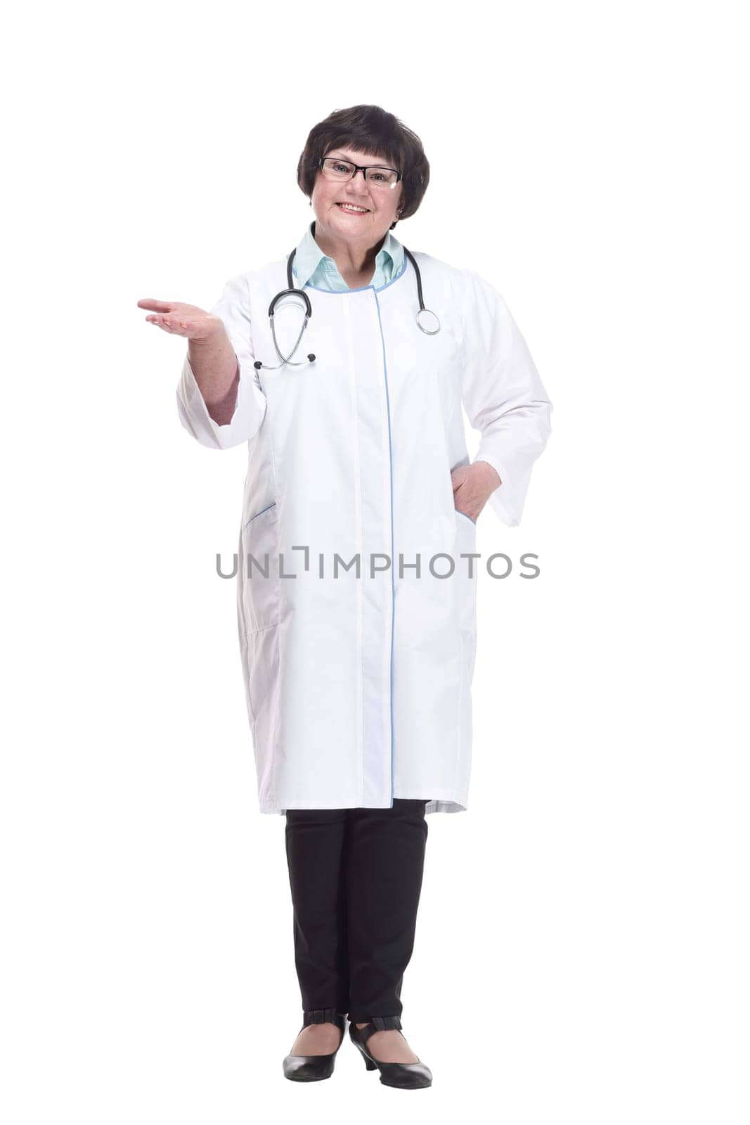 in full growth. senior female doctor with a stethoscope. isolated on a white background.