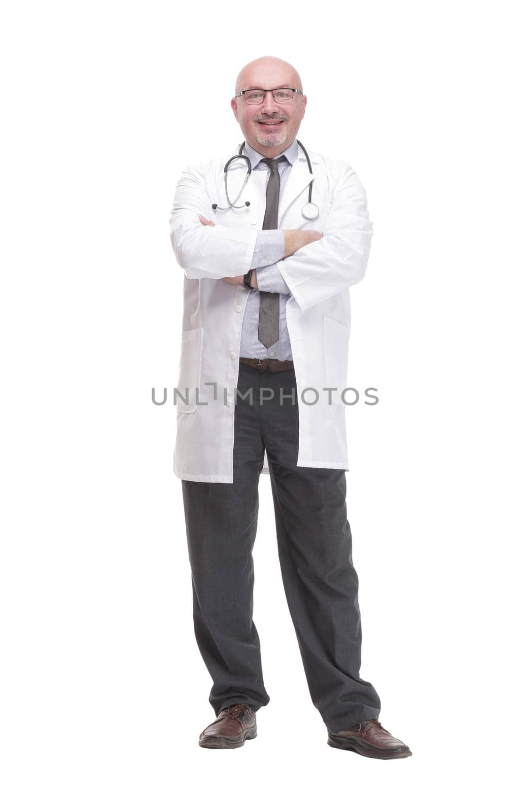 in full growth. successful mature doctor in a white coat .isolated on a white background
