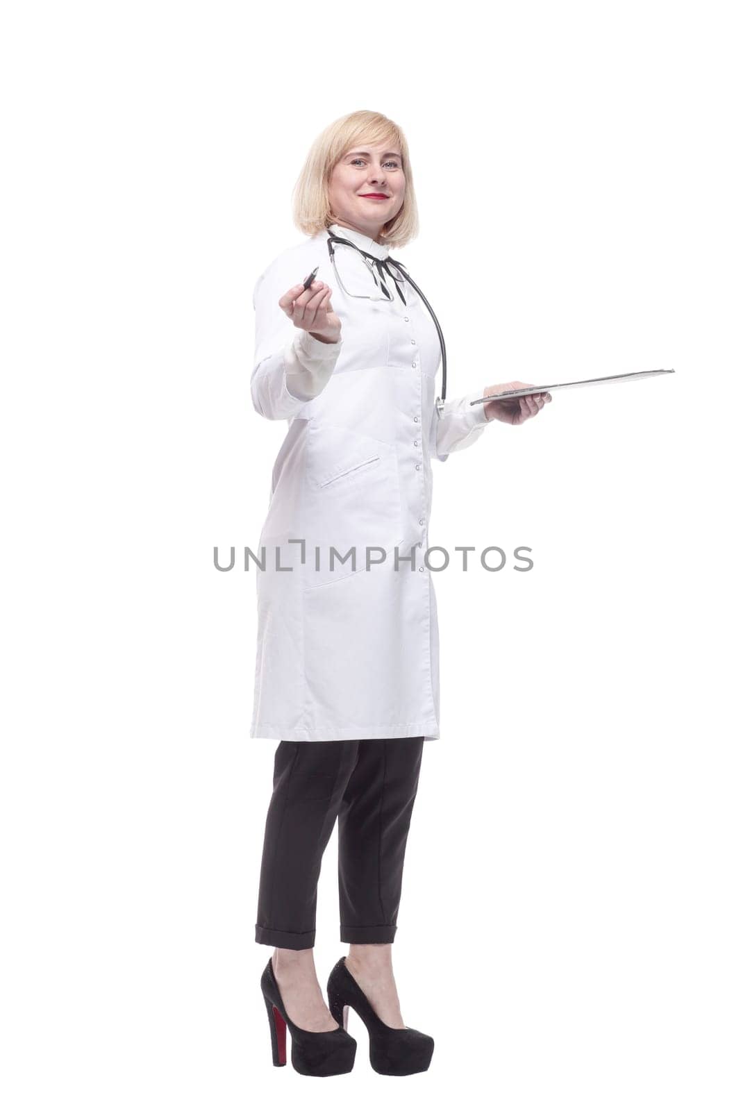 in full growth.qualified female doctor with clipboard. isolated on a white background.