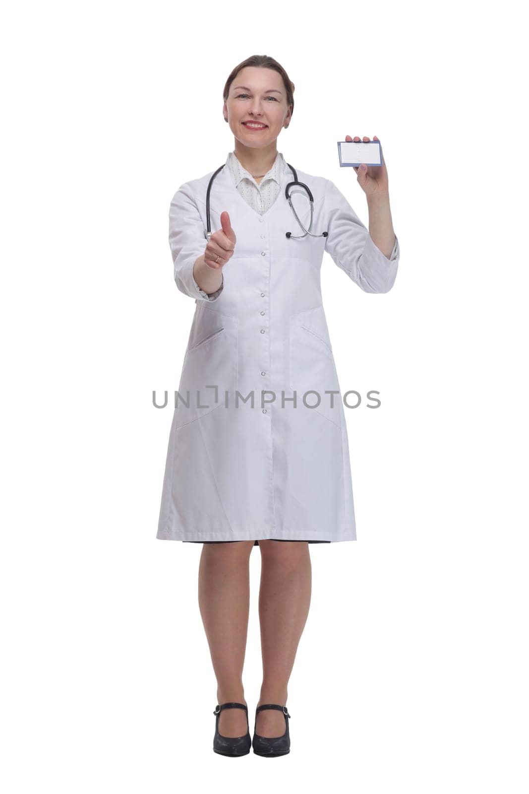 in full growth.medical doctor woman showing her visiting card. isolated on a white background.