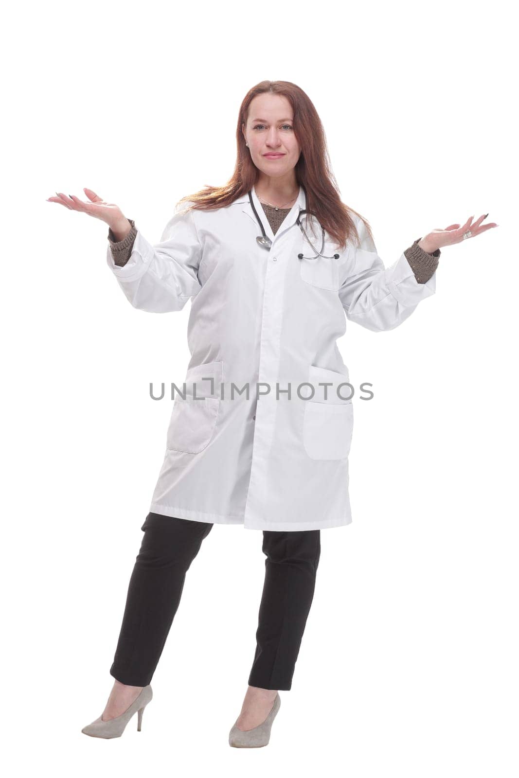 full-length. mature female doctor with stethoscope . isolated on a white background.
