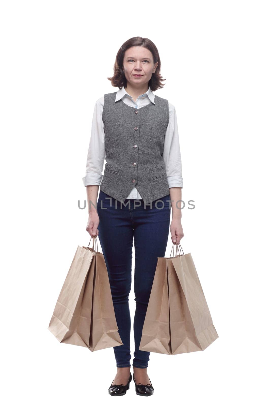 casual mature woman with shopping bags . isolated on a white background.