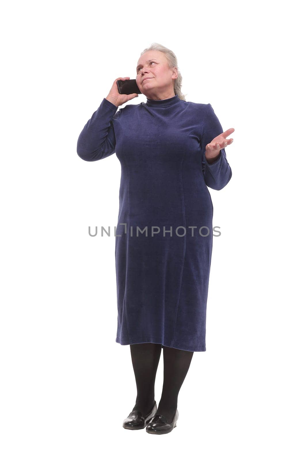 portrait of a mature woman talking on telephone. Technology, communication, age and people concept