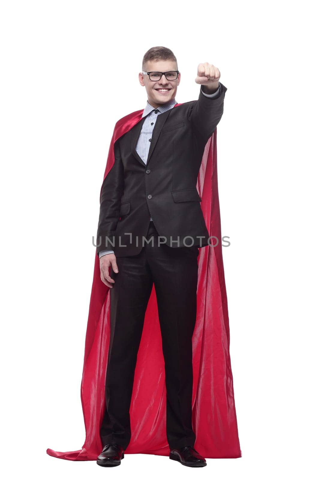 in full growth. young businessman in a superhero Cape. isolated on a white background.