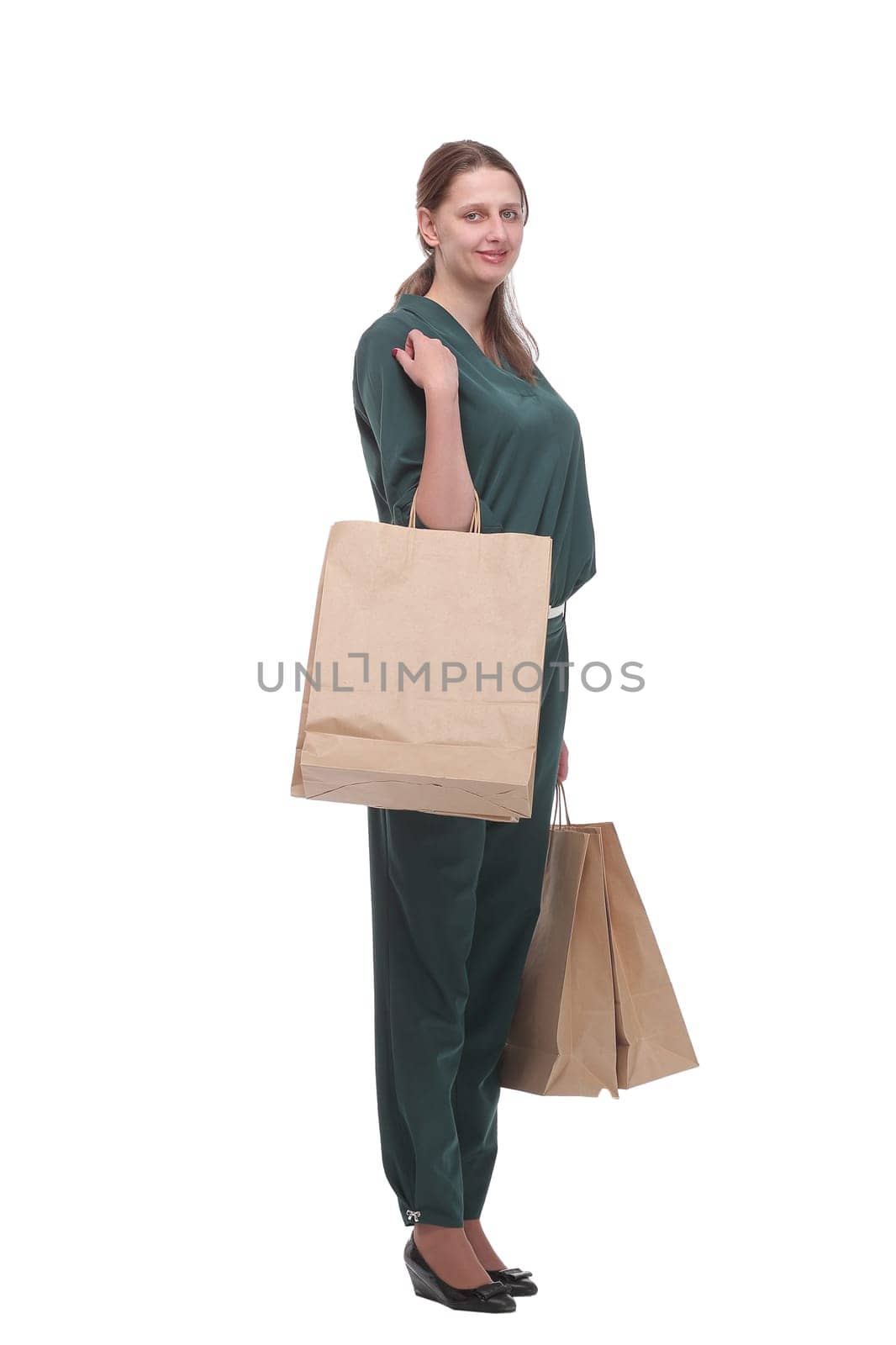 Young woman with shopping packages isolated on white. Happy shopping concept