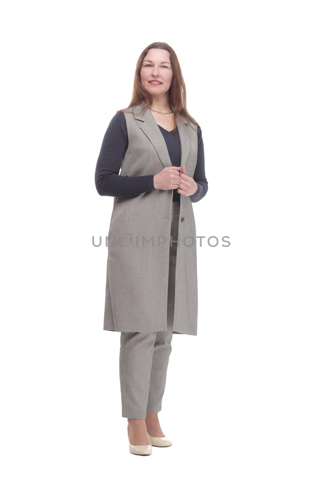 in full growth. elegant woman in a pantsuit.isolated on a white background.