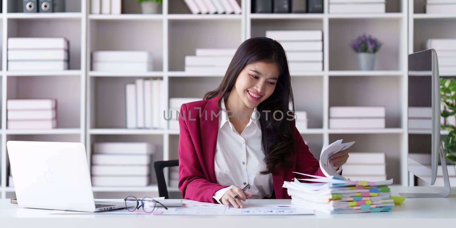 Accountant asian woman working on laptop and do document, tax, exchange, accounting and Financial advisor concept.