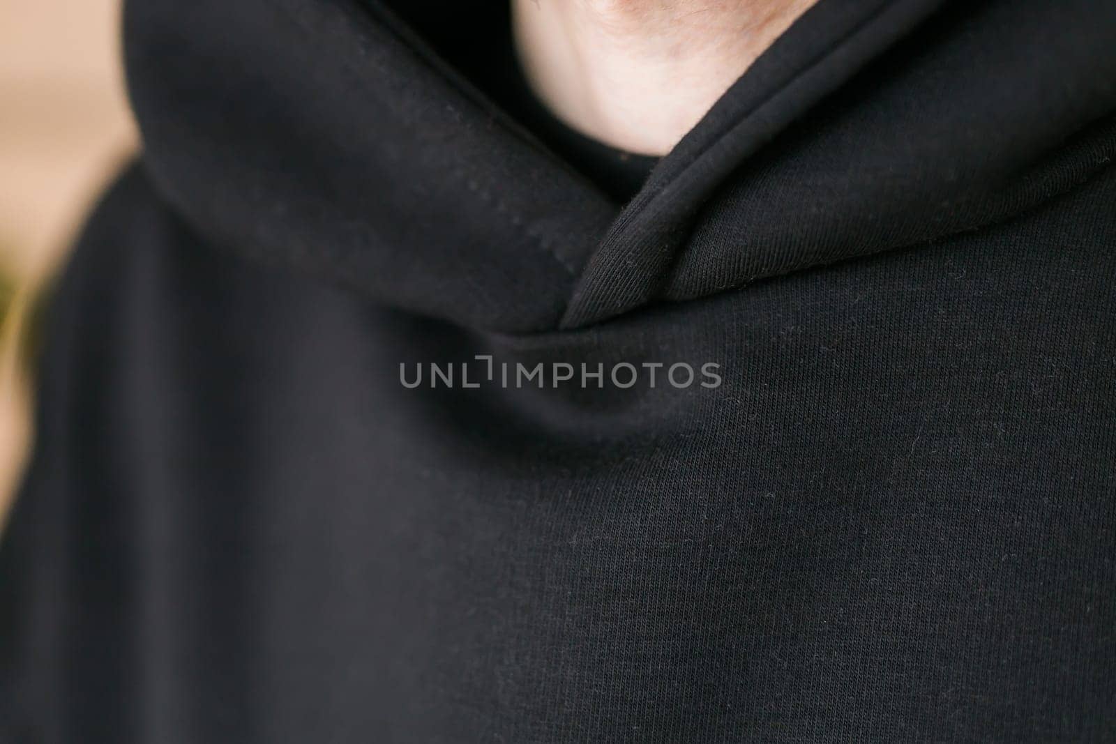 Close-up of cotton sweatshirt fabric texture clothes - design clothes tailoring and youth fashion