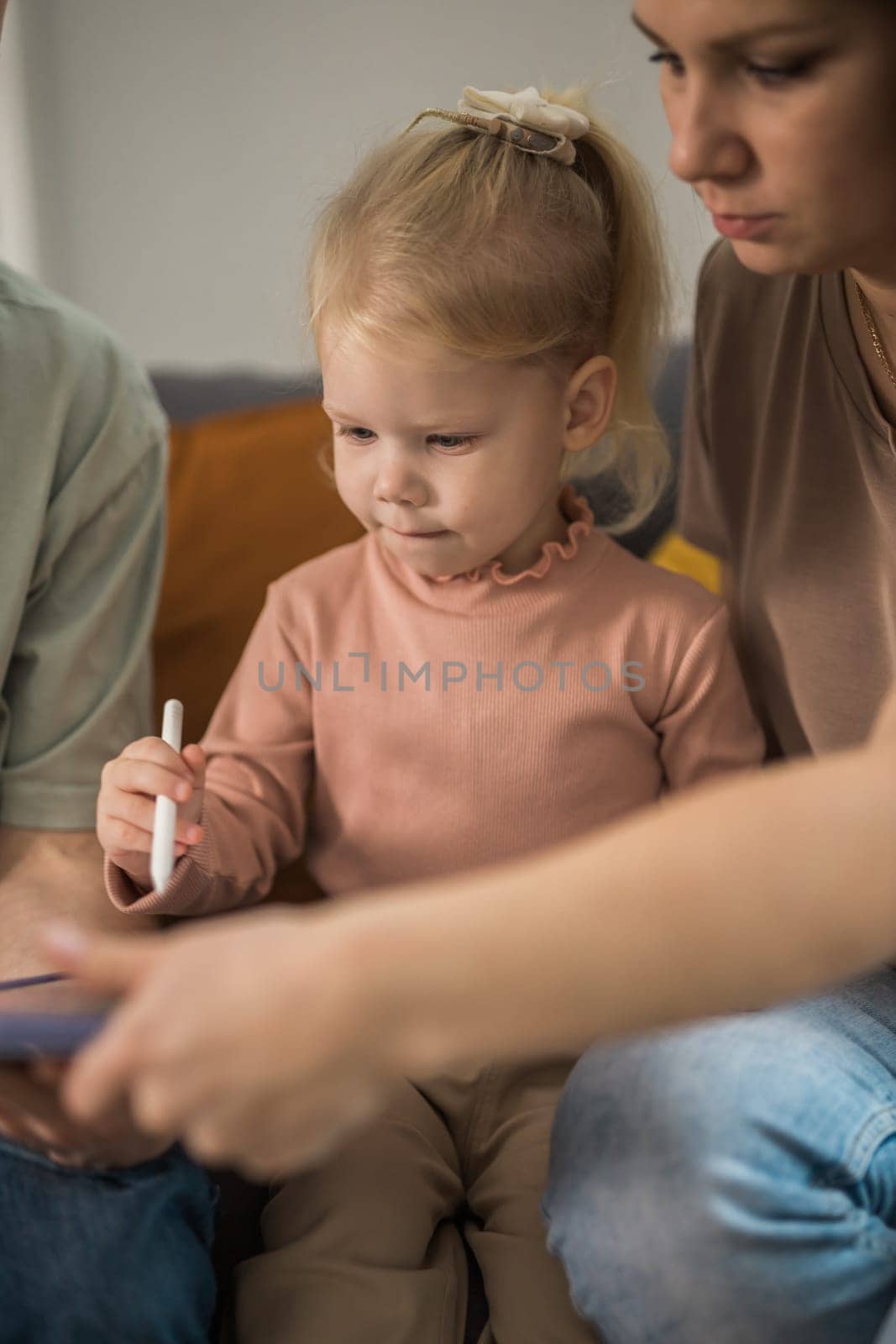 Deaf child girl with cochlear implant studying to hear sounds - recovery after cochlear Implant surgery and rehabilitation concept by Satura86