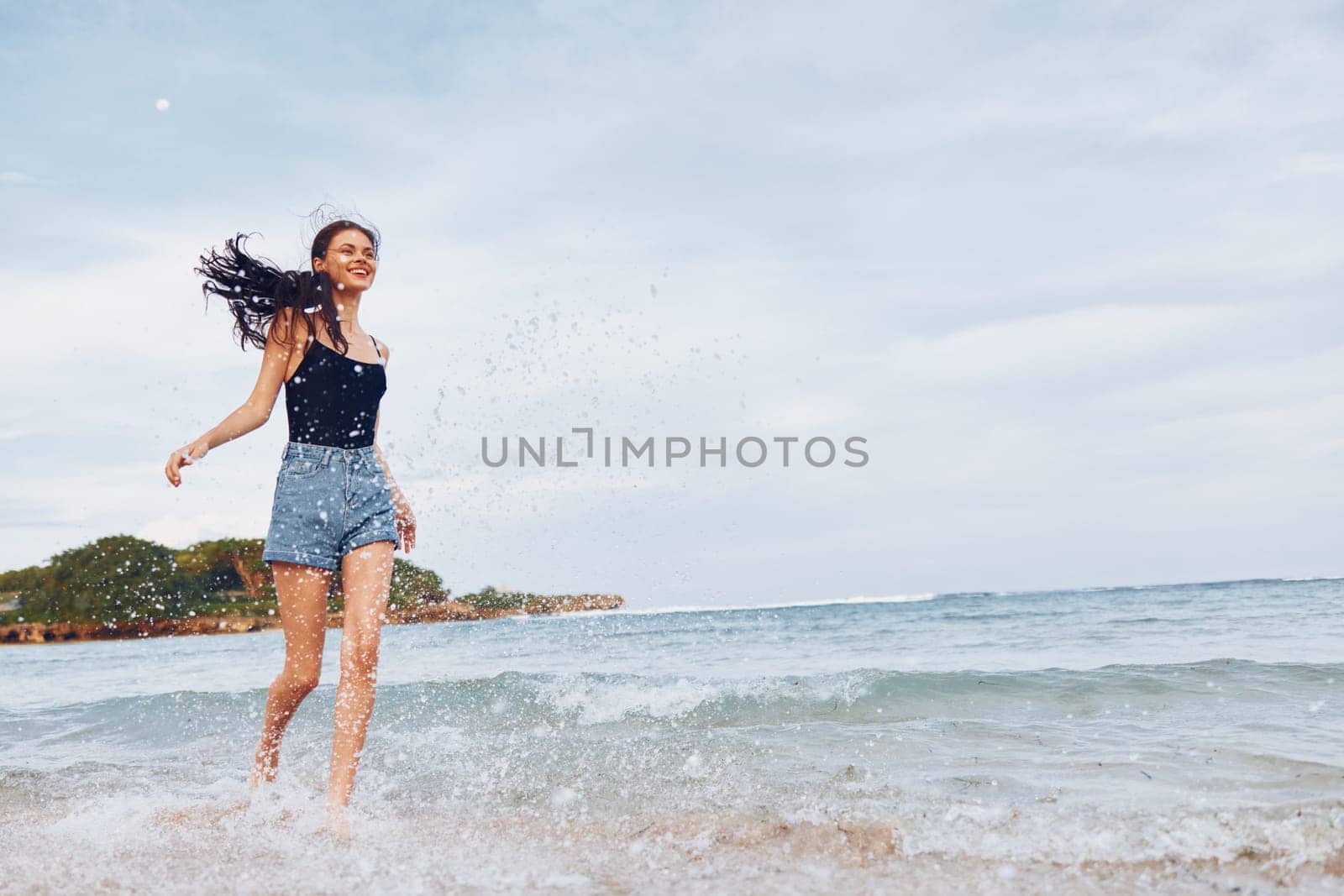 beach woman young summer sunset lifestyle travel running sea carefree smile by SHOTPRIME