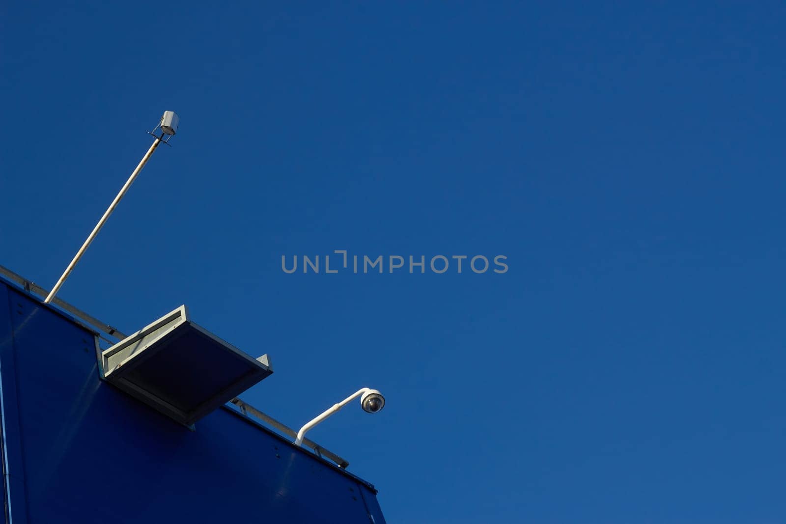Surveillance cameras roof of a retail space a by electrovenik