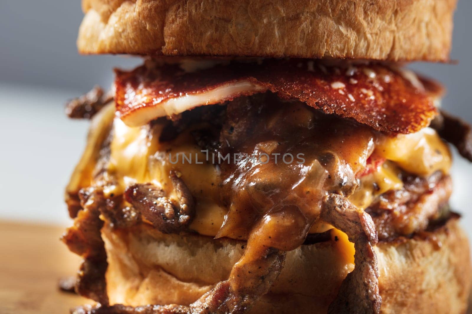 Double steak burger with smoked bacon, cheddar cheese and bbq sauce by senkaya