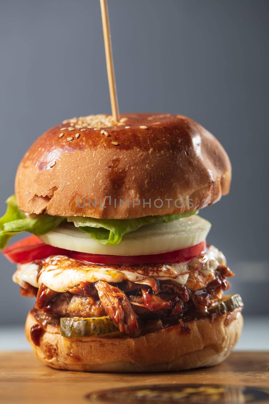 Double steak burger with smoked bacon, cheddar cheese and bbq sauce by senkaya