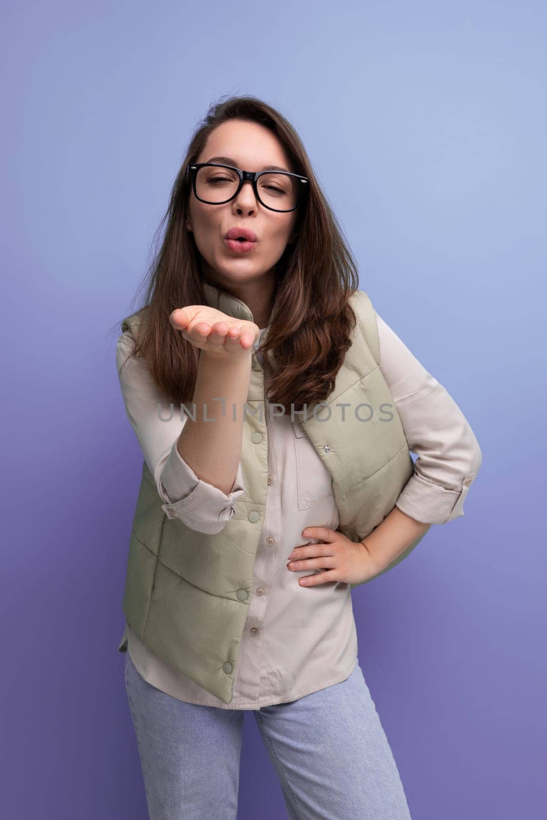 pretty European appearance young brunette woman in everyday wears glasses for vision.