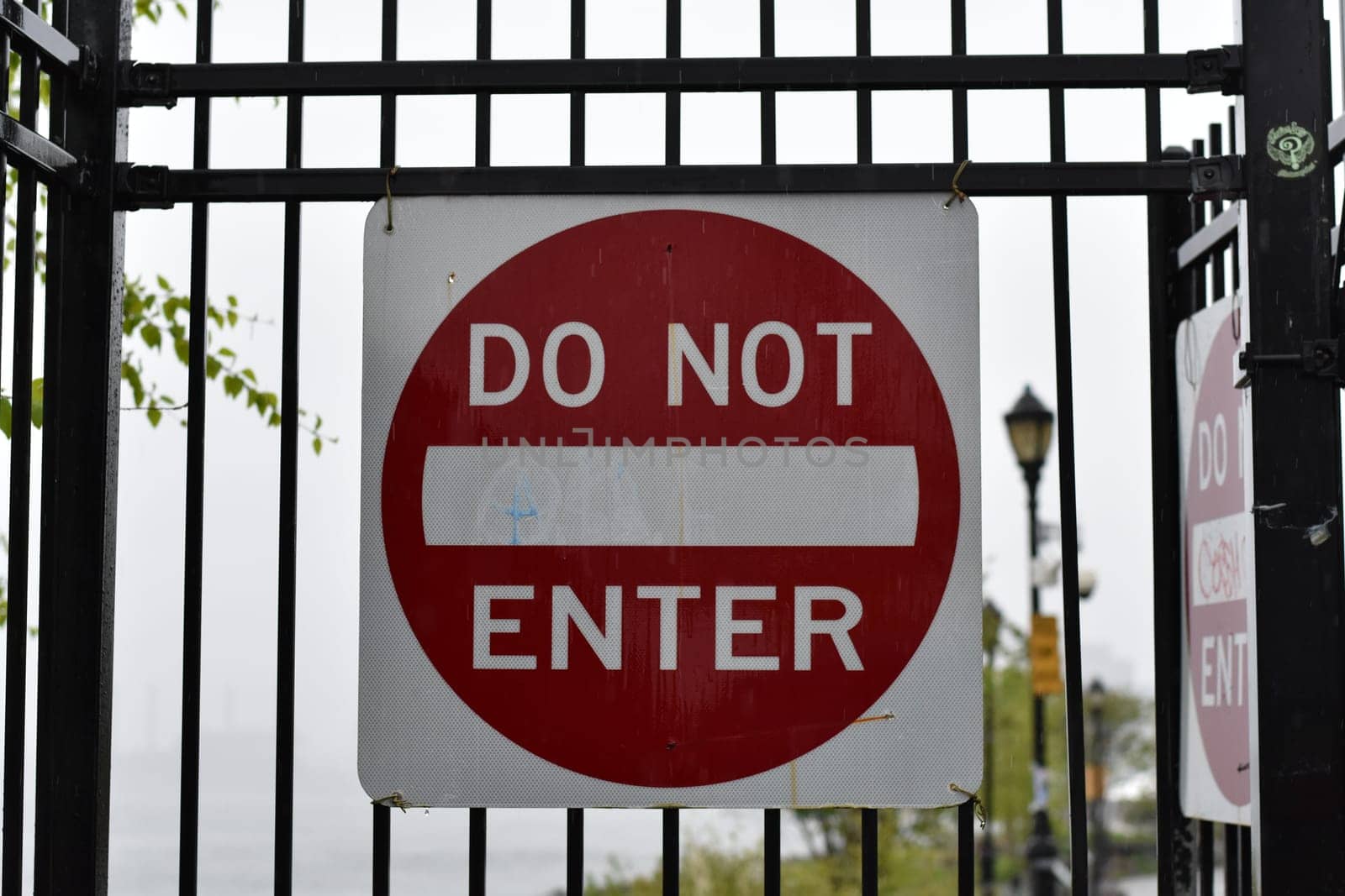 Do Not Enter Sign on Metal Fence on Roosevelt Island. High quality photo