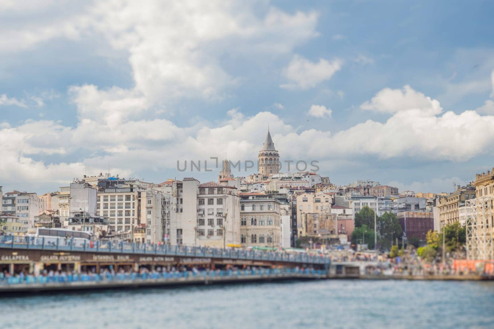 Istanbul city skyline in Turkey, Beyoglu district old houses with Galata tower on top, view from the Golden Horn.