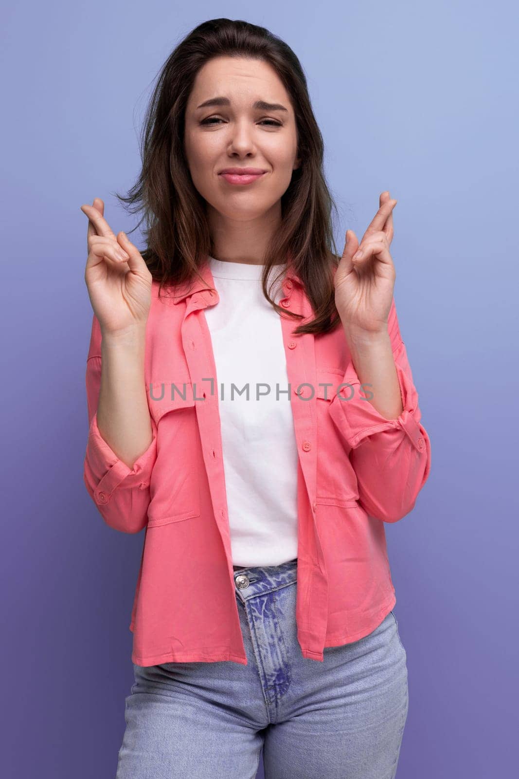 portrait of well-groomed european brunette woman in casual look isolated background.