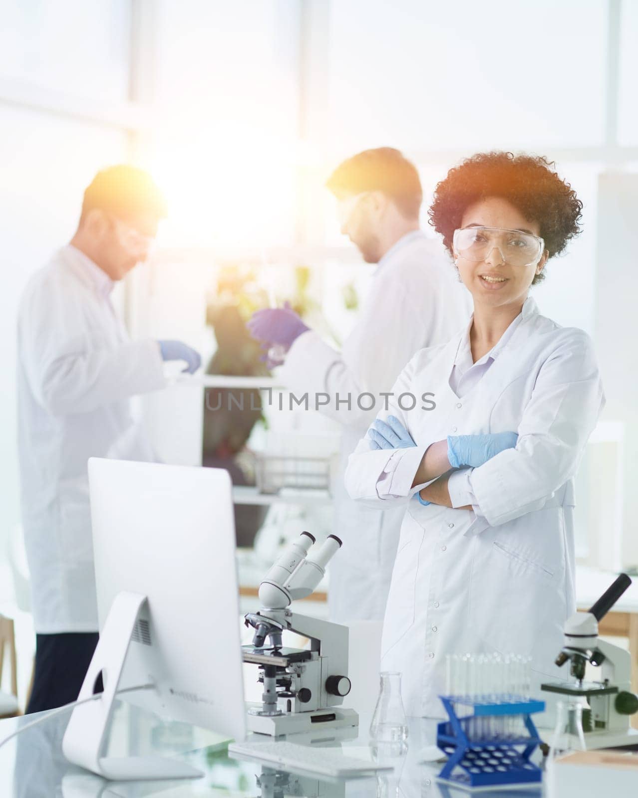 Scientists smiling together in lab