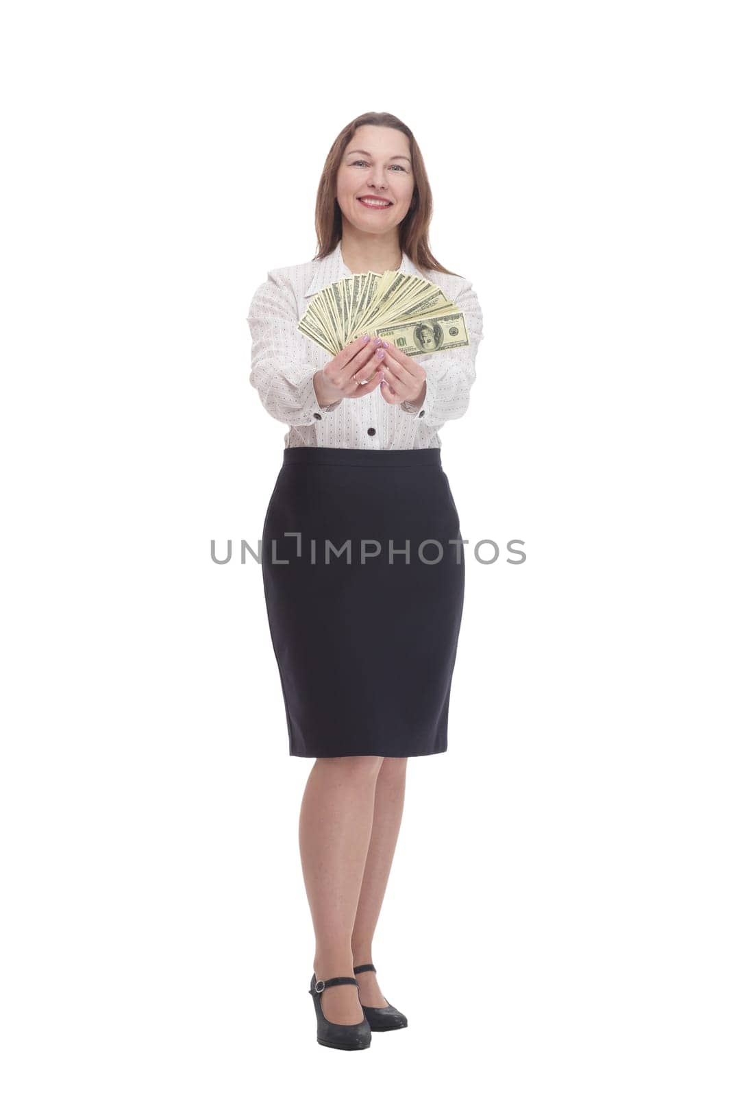 in full growth. happy business woman with banknotes. isolated on a white background.