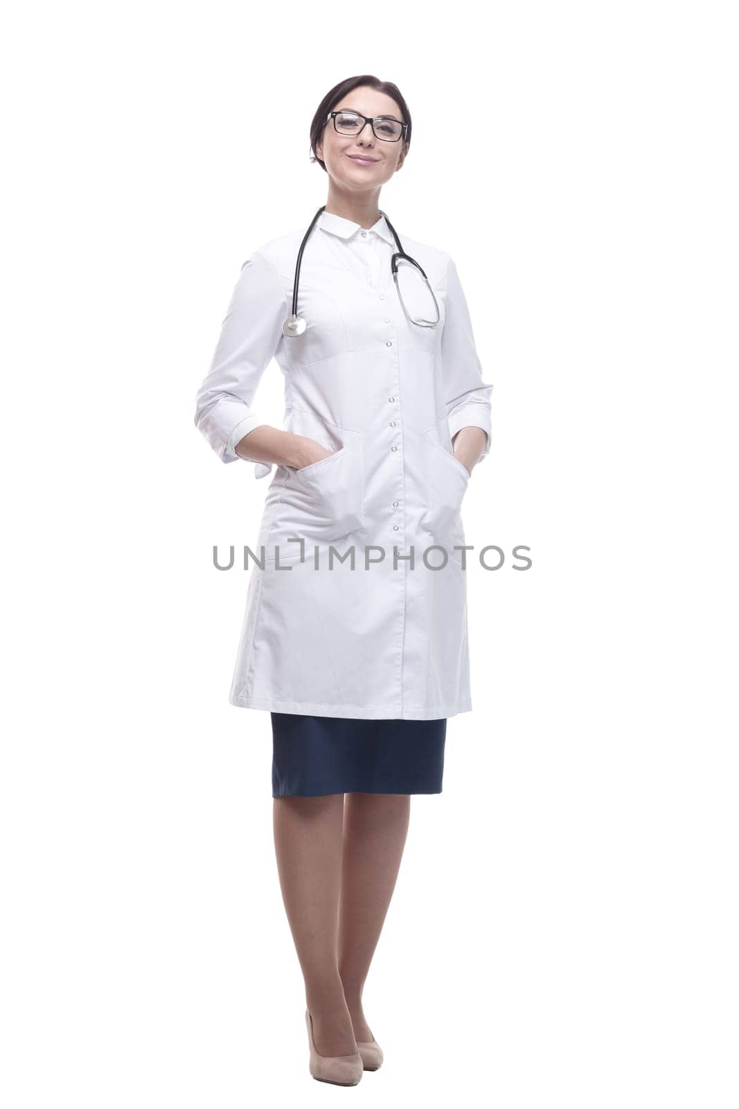 in full growth. confident female doctor with a stethoscope. isolated on a white background.