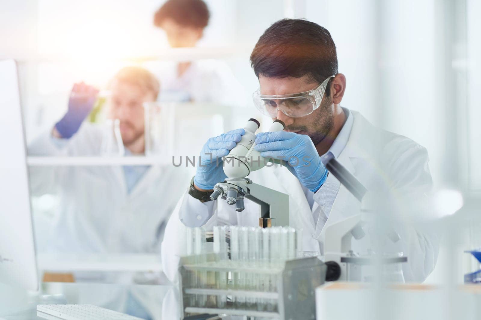 Focused male scientist working in laboratory