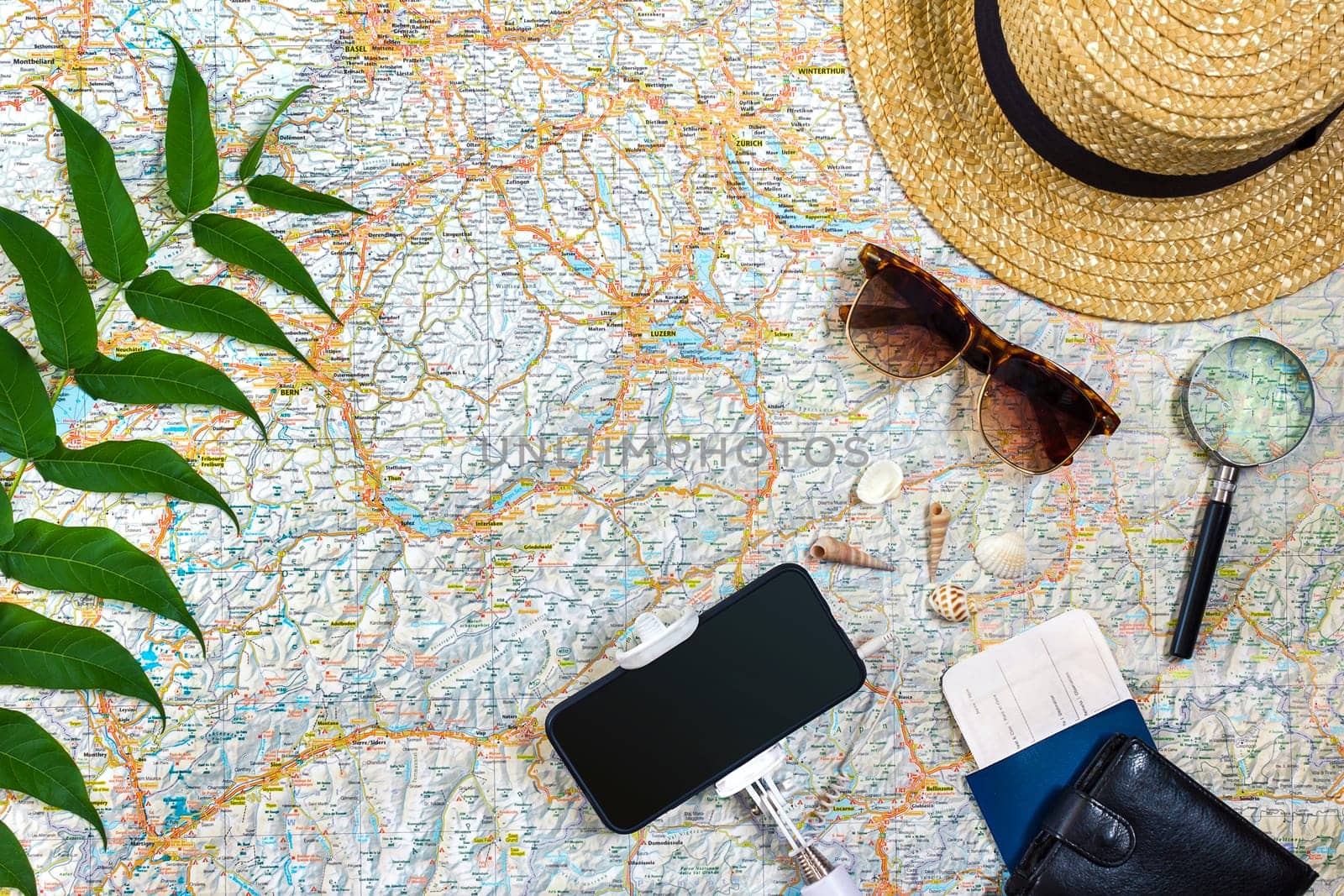 Travel plan, trip vacation accessories for trip, tourism mockup - Outfit of traveler on map background. Flat lay and copyspace. Still life