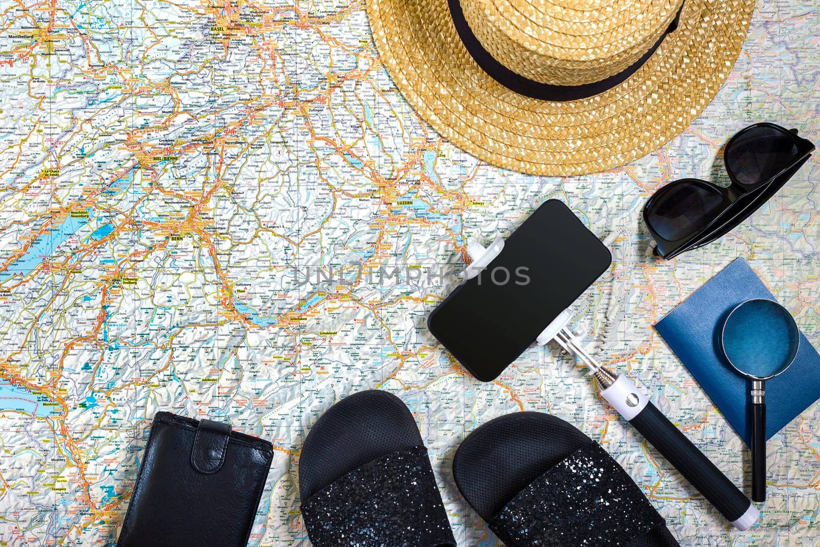 Travel plan, trip vacation accessories for trip, tourism mockup - Outfit of traveler on map background. Flat lay and copyspace. Still life