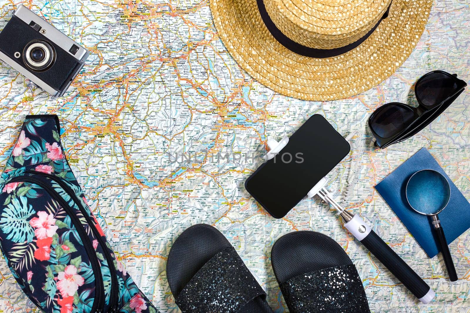 Travel plan, trip vacation accessories for trip, tourism mockup - Outfit of traveler on map background. Flat lay and copyspace. Still life