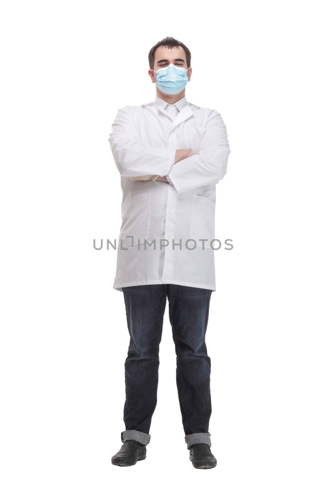 Doctor wearing protective latex gloves and face mask. Front view of man's face wearing a medical mask. Coronavirus Covid-19 and health care concept