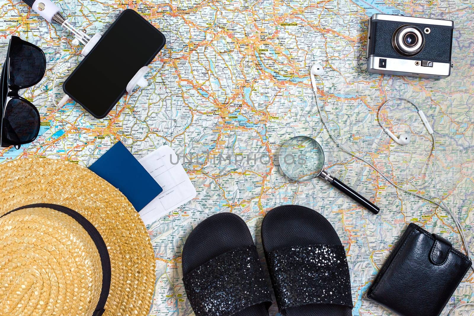 Travel plan, trip vacation accessories for trip, tourism mockup - Outfit of traveler on map background. Flat lay and copyspace. Still life