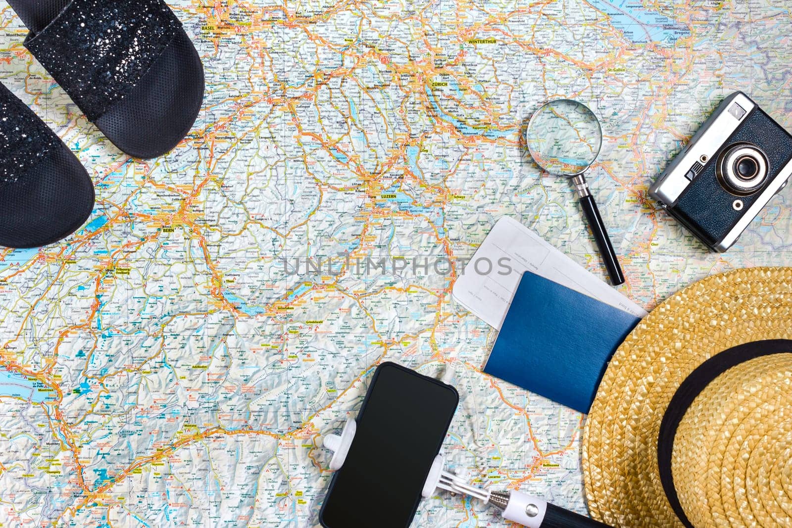 Travel plan, trip vacation accessories for trip, tourism mockup - Outfit of traveler on map background. Flat lay and copyspace. Still life