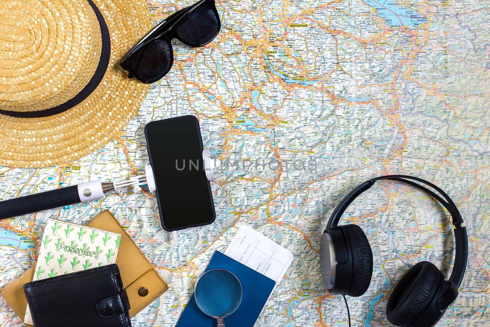 Travel plan, trip vacation accessories for trip, tourism mockup - Outfit of traveler on map background. Flat lay and copyspace. Still life