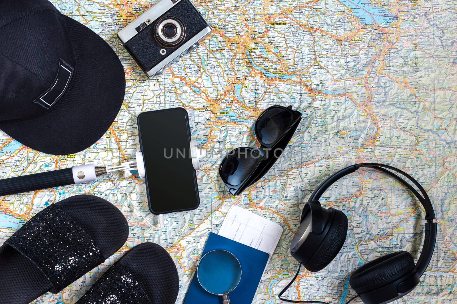 Travel plan, trip vacation accessories for trip, tourism mockup - Outfit of traveler on map background. Flat lay and copyspace. Still life