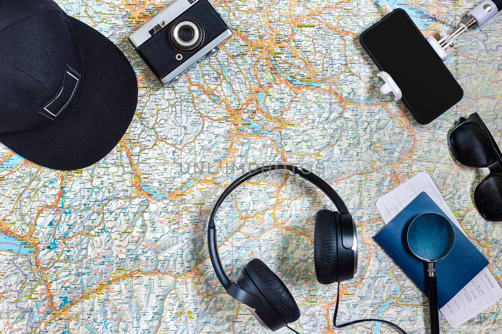 Travel plan, trip vacation accessories for trip, tourism mockup - Outfit of traveler on map background. Flat lay and copyspace. Still life